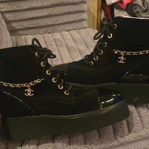 CHANEL Black Ankle Boots with Gold Accents